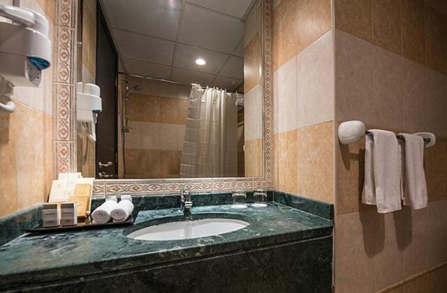 Emirates Grand Hotel Apartments - Photo4