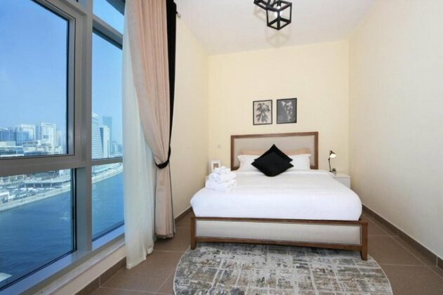 Signature Holiday Homes - Stunning 1 Bedroom Apartment In Business Bay Lake View Dubai - Photo5