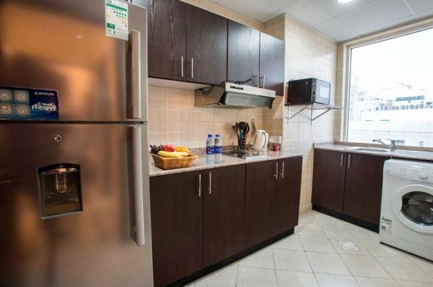 Travellers Hotel Apartment - Photo4
