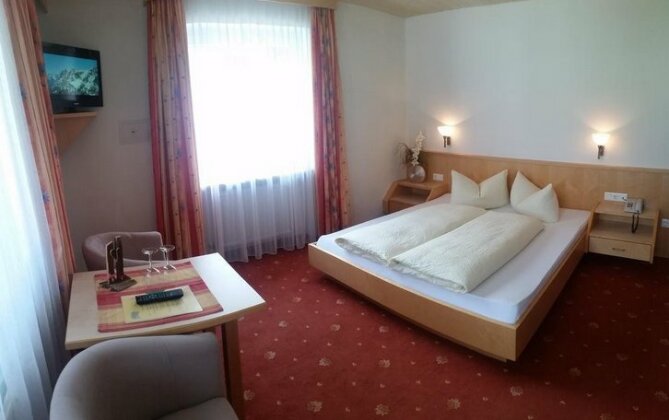 Hotel Garni Bergland - Photo4
