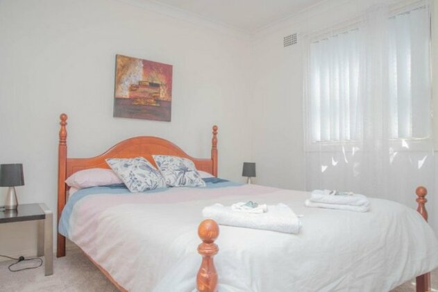 A two bedroom apartment in a peaceful suburb - Photo4