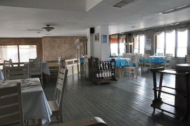 Home Care Golf Apartments - Photo5