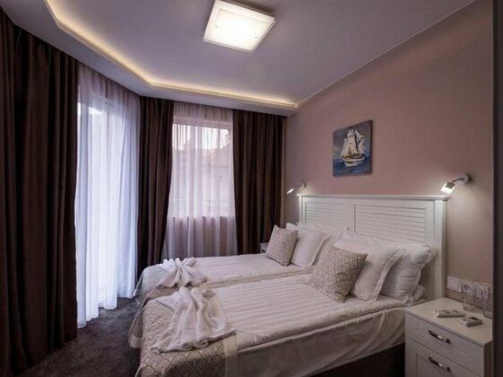 Caro Apartments & Rooms - Photo2