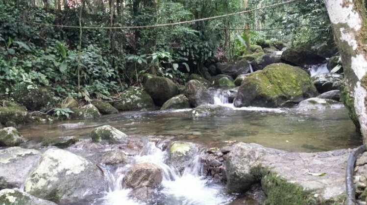 Casa em penedo com cachoeira - Photo3