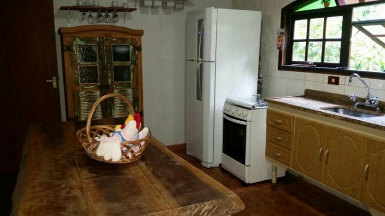 Casa em penedo com cachoeira - Photo5