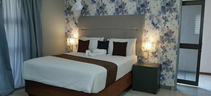 The New Mall Guesthouse - Photo4