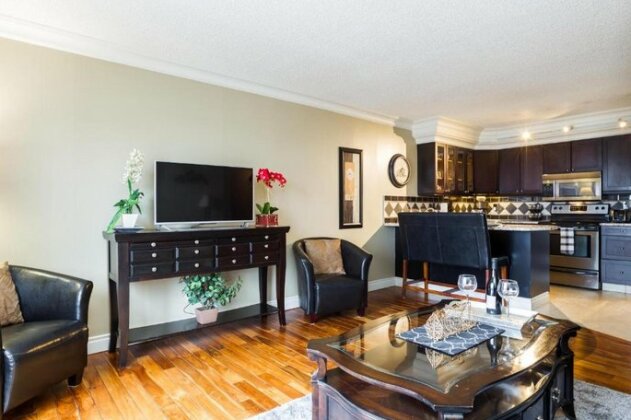 Elegant 1 Bedroom- 1 Bath Executive Condo in the Downtown Core - Free Heated Underground Parking - Photo2