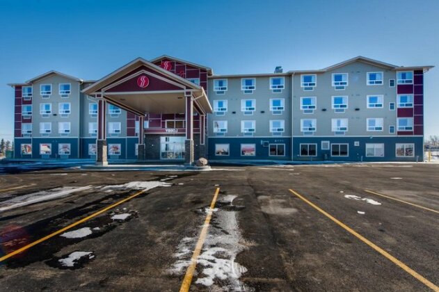 Ramada by Wyndham Grassland - Photo2