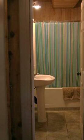 Surfs Inn Rainforest Cottages - Photo4