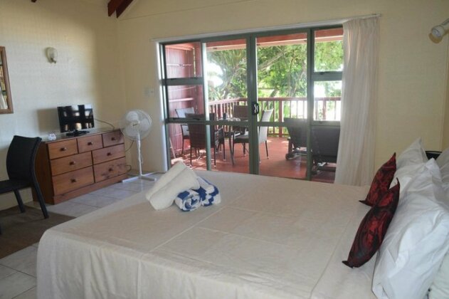 Muriavai Bungalow - Photo4