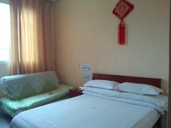 Xingfu Hotel - Photo4