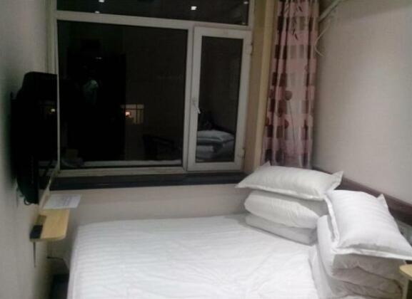 Changbaishan Xinyibai Modern Guesthouse - Photo4