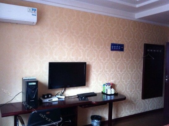 Linjiang Guanglong Business Hotel - Photo4