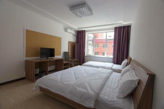 Linjiang One Plus One Inn - Photo2