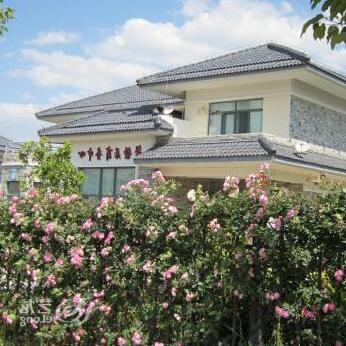 Xinjing Ju Garden Villa Hotel - Photo4