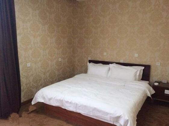 Tian Xi Zhi He Business Hotel - Photo4