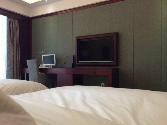 Huagang International Hotel - Photo5