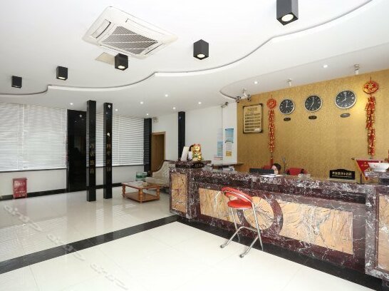 Qicai Business Hotel - Photo2