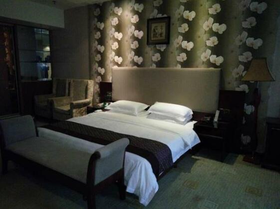 Xin Jiang Tian Hotel - Photo3