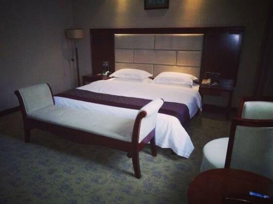 Xin Jiang Tian Hotel - Photo5