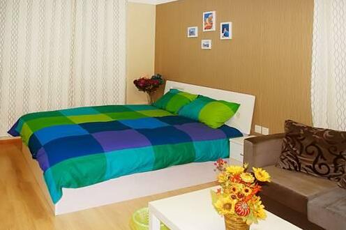 Aijia Chengdu Apartment - Photo3