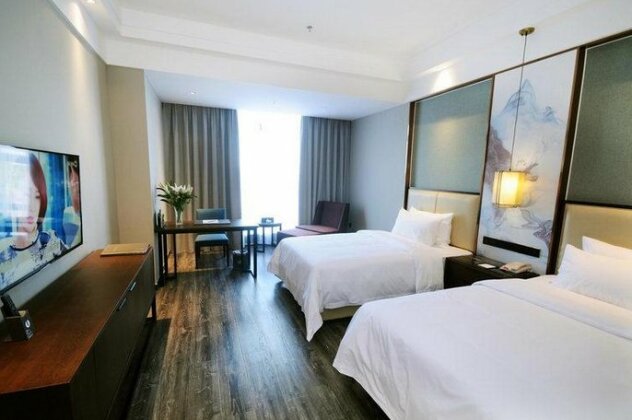 Airport Jianguo Hotel - Photo5