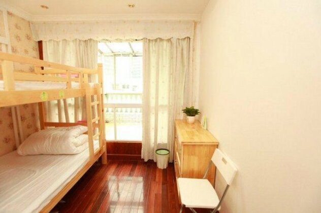 Chengdu Long Time No See Hostel - Photo4