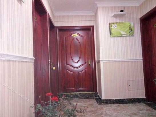 Huanle Zhijia Hostel - Photo3