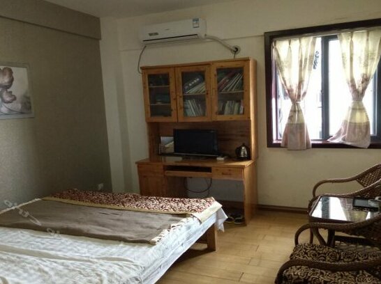 Huanle Zhijia Hostel - Photo4