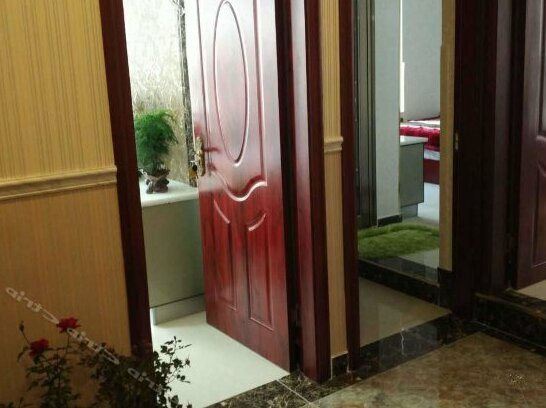Huanle Zhijia Hostel - Photo5