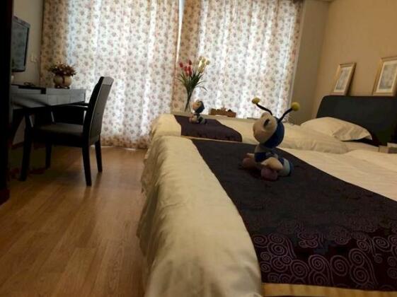 Jinli Xiangzi Boutique Hotel Aparment - Photo2