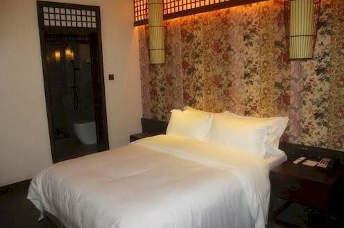 Jiudian Yiku Hotel Pinge Inn - Photo2