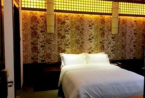 Jiudian Yiku Hotel Pinge Inn - Photo5
