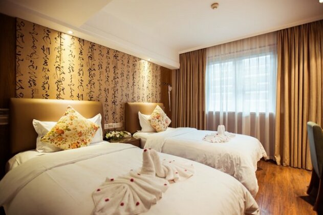 Taiji Business Hotel - Photo2