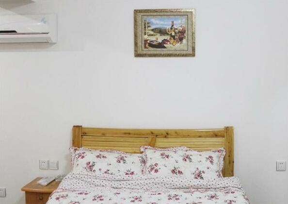 Wuju Hotel Apartment - Photo2