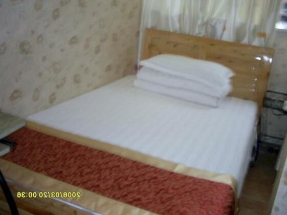 Chongqing Wannianhong Apartment - Photo2