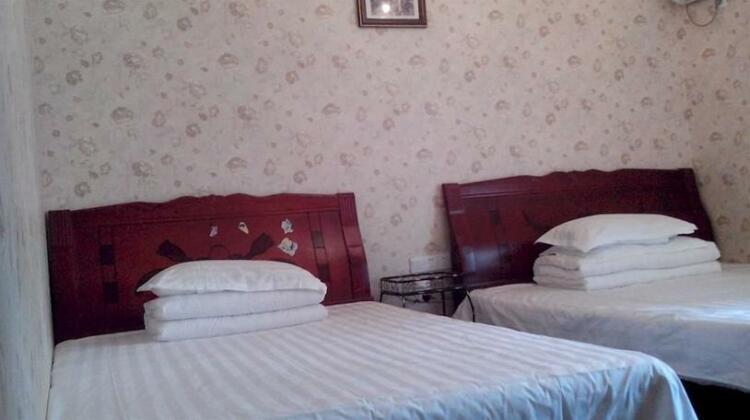 Chongqing Wannianhong Apartment - Photo4