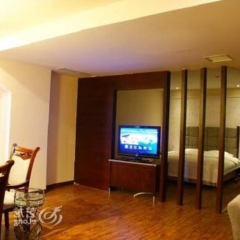 Migeer Jinyao Hotel - Photo4