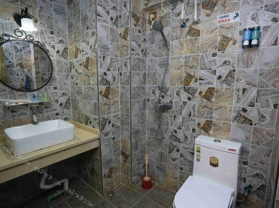 Wiseman Travel Theme Hotel - Photo4