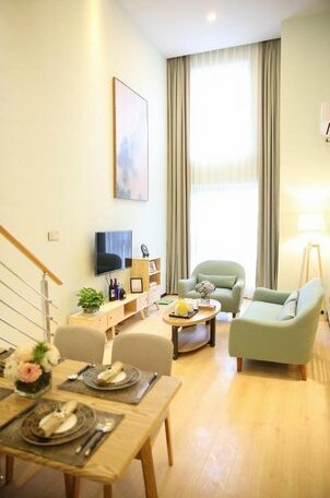 Zhenai Yijia ApartHotel - Photo2