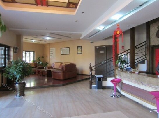 Chuxiong Yiren Taiyangnv Hotel - Photo2