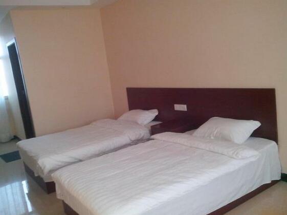 Xinsheng Hotel - Photo4