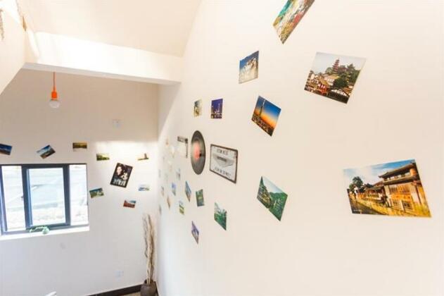 Xiaoermei cafe Hostel - Photo2