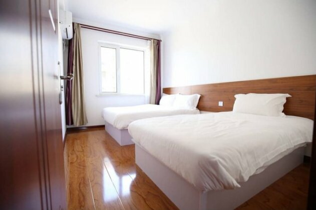 Dalian FENGHE TINGYUAN Apartment - Photo5
