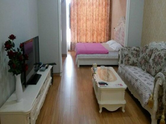 Dalian Hehe Apartment Hotel