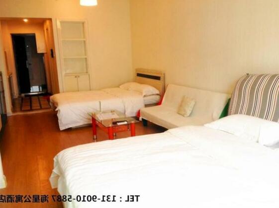 Dalian Sanxing Mansion Starfish Hotel Apartment - Photo4