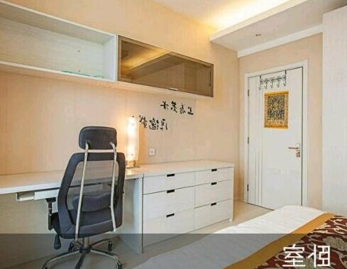Dalian Xinghai Wenxing ApartHotel - Photo5