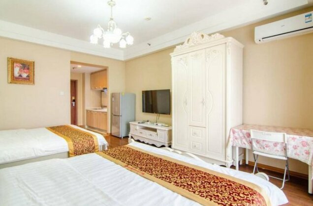 Dalian Xinyue Hotel Apartment - Photo5
