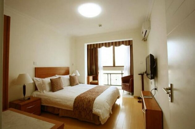 Dalian Xuanyi Selected Holiday Apartment - Photo5