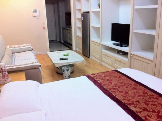 Dalian Yinghao Zuoan Classic Apartment - Photo2